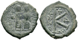 Justin II and Sophia (565-578). Æ 20 Nummi (21mm, 5.25g). Thessalonica, year 4 (568/9). Nimbate figures of Justin and Sophia seated facing on double t...