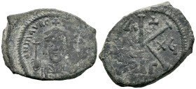 Maurice Tiberius (582-602). Æ 20 Nummi (24mm, 5.86g). Constantinople, year 15 (596/7). Crowned and cuirassed bust facing, holding globus cruciger and ...