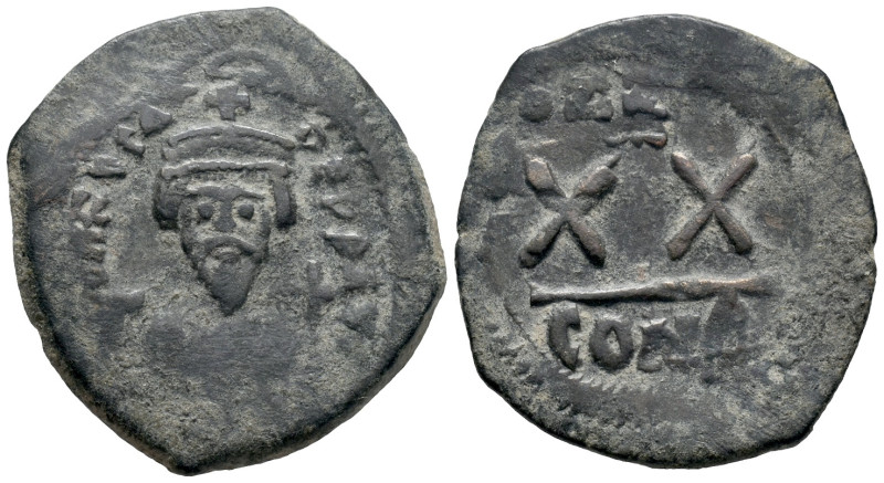 Phocas (602-610). Æ 20 Nummi (25mm, 5.20g). Constantinople. Crowned bust facing,...