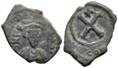 Phocas (602-610). Æ 10 Nummi (16mm, 2.28g). Constantinople. Crowned, draped, and cuirassed facing bust / Large X; cross above. DOC 39; MIB 66; SB 646....