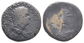 Vespasian (69-79). Æ Dupondius (31mm, 9.53g). Rome. Radiate head r. R/ Roma seated l. on cuirass, holding wreath and parazonium; shields behind. Cf. R...
