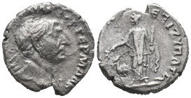 Trajan (98-117). AR Denarius (17mm, 2.04g). Rome, 112-3. Laureate bust r., slight drapery. R/ Arabia standing l., holding branch and bundle of canes; ...