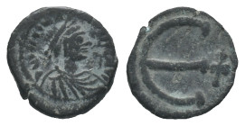 Justinian I (527-565). Æ 5 Nummi (13.5mm, 1.71g). Constantinople, 543-565. Pearl-diademed, draped and cuirassed bust r. R/ Large Є; cross to r. Sear 1...
