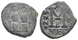 Justin II and Sophia (565-578). Æ 40 Nummi (28mm, 12.21g). Nicomedia, year 5. Crowned and cuirassed bust facing, holding cross on globe and shield. R/...