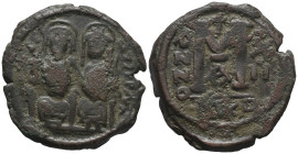Justin II and Sophia (565-578). Æ 40 Nummi (30mm, 14.48g). Nicomedia, year 12. Crowned and cuirassed bust facing, holding cross on globe and shield. R...