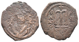 Tiberius II Constantine (578-582). Æ 40 Nummi (31mm, 12.43g). Constantinople, year 7. Crowned facing bust, wearing consular robes, holding mappa and e...