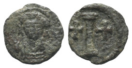 Tiberius II Constantine (578-582). Æ 10 Nummi (18mm, 1.79g). Ravenna. Helmeted and cuirassed facing bust, holding globus cruciger and shield. R/ Large...