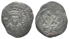 Phocas (602-610). Æ 20 Nummi (25mm, 5.89g). Cyzicus. Crowned facing bust, wearing consular robes, holding mappa and cross. R/ Large XX; star above; KY...