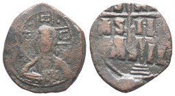 Anonymous, time of Romanus III (1028-1034). Æ 40 Nummi (17mm, 4.40g). Constantinople. Bust of Christ facing, holding Gospels. R/ Legend in three lines...