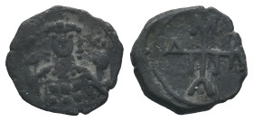 Manuel I (1143-1180). Æ Half Tetarteron (18mm, 2.57g). Uncertain Greek mint. Crowned facing bust of Michael, holding labarum and globus cruciger. R/ M...