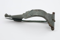 Roman Aucissa Bow Brooch with Wolf's Head , Circa 1st-2nd Century AD