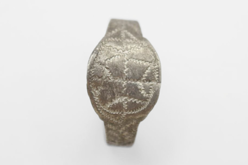 Migration period silver ring with zig-zagging decoration; 1.66 grams, 21.10mm in...