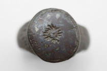 Medieval Bronze Ring with Sun Symbol , Circa 8th - 10th Century AD