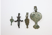 A Group of Four Roman Military Pendants, Circa
1st ,2nd Century AD