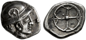 GALLIA. 
MASSALIA. Obol, about 450-425. AR 0.92 g. Male head r. wearing helmet decorated with wheel. Rev. Four-spoked wheel. G. Maurel, Corpus des mo...