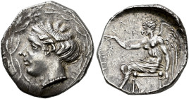 BRUTTIUM. 
TERINA. Nomos, about 440-425. AR 7.57 g. Within olive wreath, head of nymph Terina l., hair in ampyx and rolled in on the back. Rev. TEPI ...