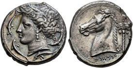 SICILIA. 
PUNIC MINTS. 'MMHNT. Tetradrachm, about 350-330. AR 16.61 g. Head of Tanit l., crowned with reed, wearing triple ear- pendant and necklace;...