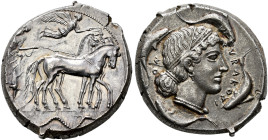 SICILIA. 
SYRACUSE. Tetradrachm, about 450-440. AR 17.46 g. Slow quadriga r., the standing driver, wearing long, sleeveless chiton, holding the reins...