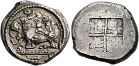 MACEDONIA. 
ACANTHUS. Tetradrachm, about 470. AR 17.01 g. Lion r., attacking bull kneeling l., above, Θ, below triple exergual line, bucranium. Rev. ...