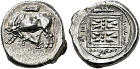 ILLYRIA. 
MONUNIOS, king about 300 BC. Stater, Dyrrhachion. AR 10.56 g. Cow standing l., turning her head down to her suckling calf; above, jaw of th...