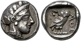 ATTICA. 
ATHENS. Drachm, about 430-420. AR 4.18 g. Head of Athena r., wearing crested helmet decorated with three olive leaves and palmette, disc ear...