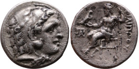 Alexander III (336-323 BC) Drachm Obverse: Head of Herakles to right, wearing lion skin headdress Rev: Zeus seated left on low throne, holding long sc...