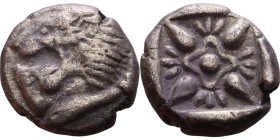 Ionia: Miletos (VI Century BC) Silver coin. Obverse:  Lion's head left   Reverse: Stellate pattern within incuse square.