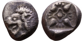 Ionia: Miletos (VI Century BC) Silver coin. Obverse:  Lion's head left   Reverse: Stellate pattern within incuse square.