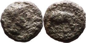 Antiochos VI Dionysos (Seleukid King: 145-141 BC). AE bronze. Obv.: radiate and wreathed head r. Rev.: elephant standing l., holding torch with trunk;...