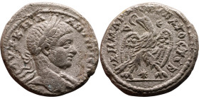 Elagabalus (218-222) Tetradrachm. Obverse: Bust of emperor. Reverse: Eagle standing left, head right, wreath in beak, tail right, wings spread