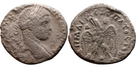 Elagabalus (218-222) Tetradrachm. Obverse: Bust of emperor. Reverse: Eagle standing left, head right, wreath in beak, tail right, wings spread