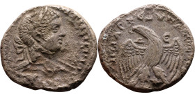 Elagabalus (218-222) Tetradrachm. Obverse: Bust of emperor. Reverse: Eagle standing left, head right, wreath in beak, tail right, wings spread
