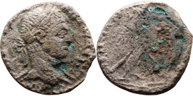 Elagabalus (218-222) Tetradrachm. Obverse: Bust of emperor. Reverse: Eagle standing left, head right, wreath in beak, tail right, wings spread