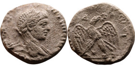 Elagabalus (218-222) Tetradrachm. Obverse: Bust of emperor. Reverse: Eagle standing left, head right, wreath in beak, tail right, wings spread