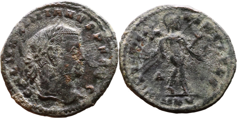 Maximianus. (286-305 ) Follis Obv: Laureate head right. Rev.: Mars, helmeted, wa...