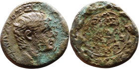 Tiberius (14-37) Bronze coin. Obv: Bust of emperor. Rev: Greek inscription within a wreath.