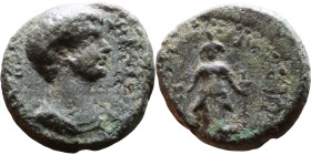 Caracalla (211-217) Arabia: Bostra. Bronze coin. Obverse: Bust of emperor. Reverse:F ortuna standing facing, holding sceptre surmounted by trophy and ...