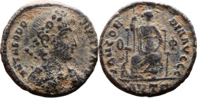 Theodosius I (379-395) Follis. Obv: Pearl-diademed, draped, cuirassed bust right Rev.: Constantinopolis on throne