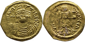 Maurice Tiberius (582-602) Constantinople Solidus. Obverse: D N MAVRC TIb PP AVI, cuirassed bust facing wearing plumed helmet, holding cross on globe,...