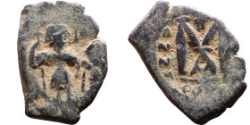 Constans II (641-668) Follis. Obverse: Imperial figure holding cross and globus Reverse: m and inscription