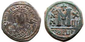 Maurice Tiberius (582-602) Follis Obverse: Crowned bust facing, wearing consular robes, holding mappa and eagle-tipped scepter , Reverse: Large M cros...