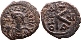 Maurice Tiberius (582-602) Half Follis. Obverse: Helmeted and cuirassed bust facing, holding globus cruciger and shield., Reverse: Large K above cross...
