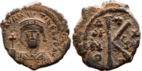 Maurice Tiberius (582-602) Half Follis. Obverse: Helmeted and cuirassed bust facing, holding globus cruciger and shield., Reverse: Large K above cross...