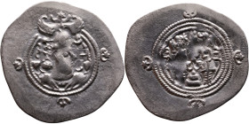 Khosrow II (591-628) Drachm Obv: Bust of a king wearing a winged crown, turned to the right. Rev: Blazing altar of fire situated between two guards