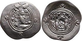 Khosrow II (591-628) Drachm Obv: Bust of a king wearing a winged crown, turned to the right. Rev: Blazing altar of fire situated between two guards