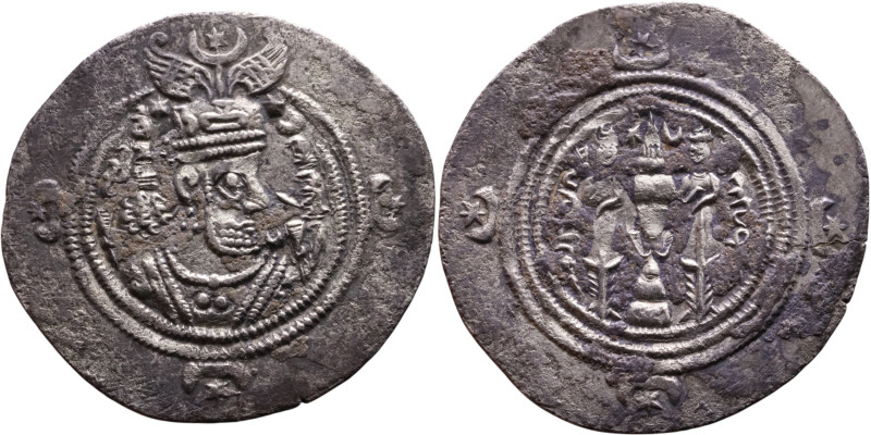 Khosrow II (591-628) Drachm Obv: Bust of a king wearing a winged crown, turned t...