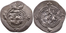 Khosrow II (591-628) Drachm Obv: Bust of a king wearing a winged crown, turned to the right. Rev: Blazing altar of fire situated between two guards