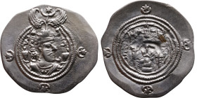 Khosrow II (591-628) Drachm Obv: Bust of a king wearing a winged crown, turned to the right. Rev: Blazing altar of fire situated between two guards