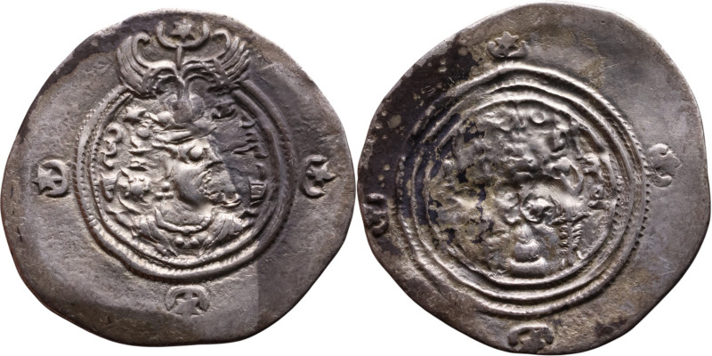 Khosrow II (591-628) Drachm Obv: Bust of a king wearing a winged crown, turned t...