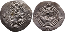 Khosrow II (591-628) Drachm Obv: Bust of a king wearing a winged crown, turned to the right. Rev: Blazing altar of fire situated between two guards
